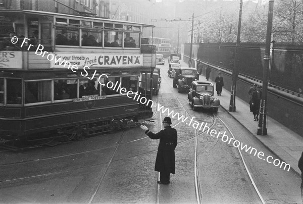 NASSAU STREET POINTSMAN WITH TRAM